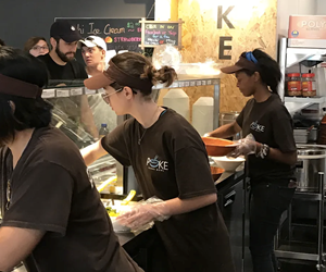 staff making poke bowls